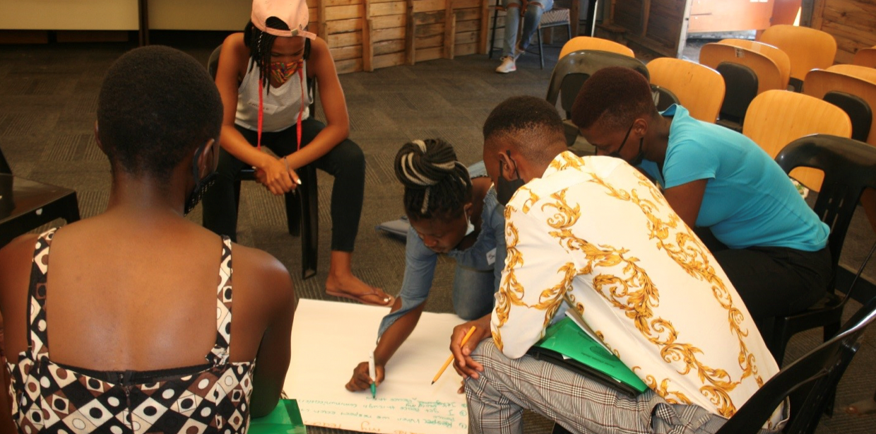 Participants engaging in inner healing activities during the Creators or Peace workshops in Johannesburg. 
